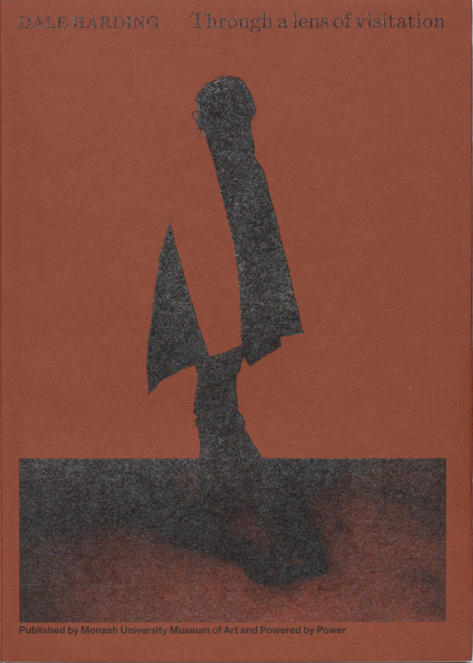A brown book cover showing the silhouette of a person walking.