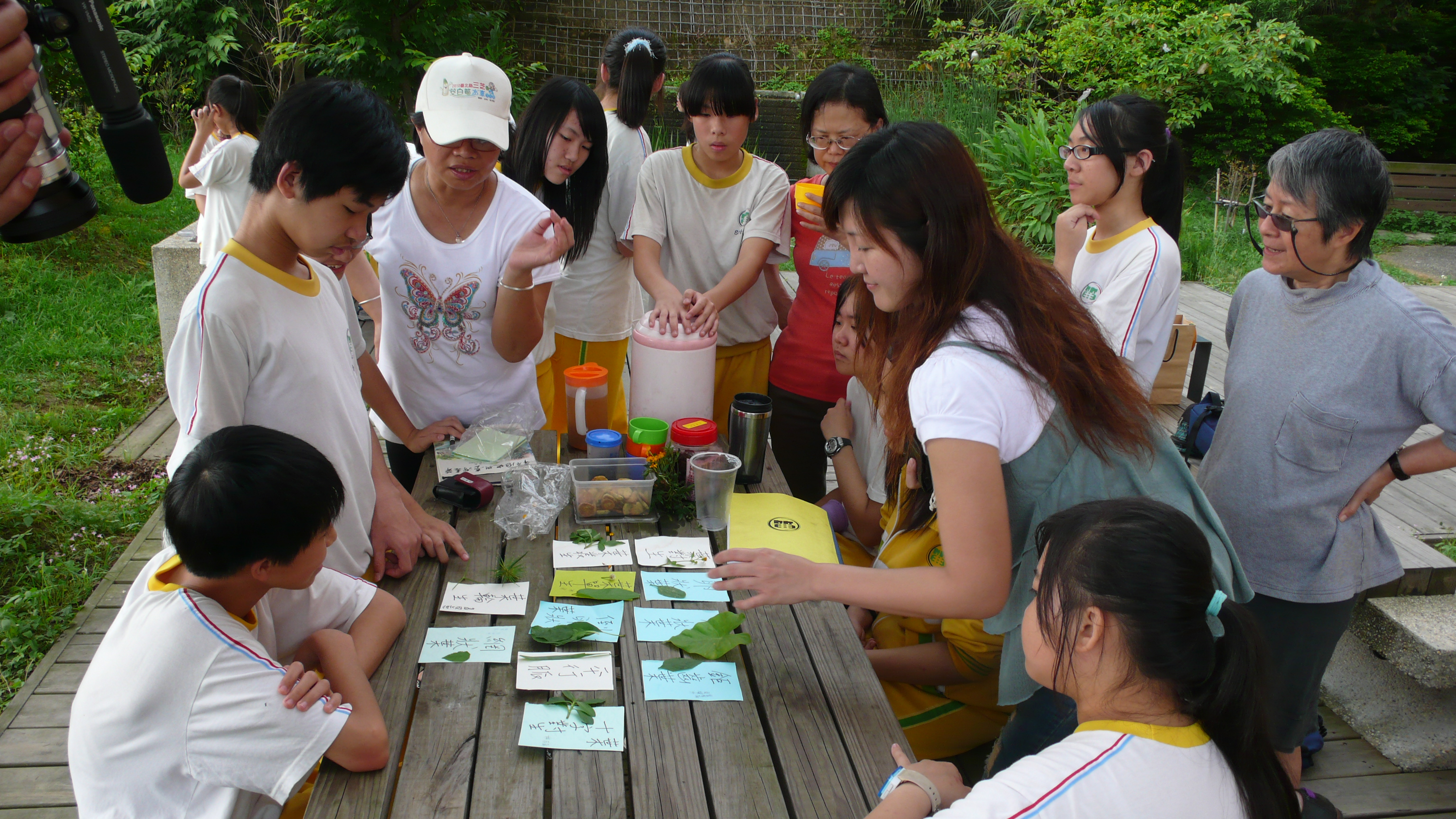 A group of middle-school kids doing an activity.