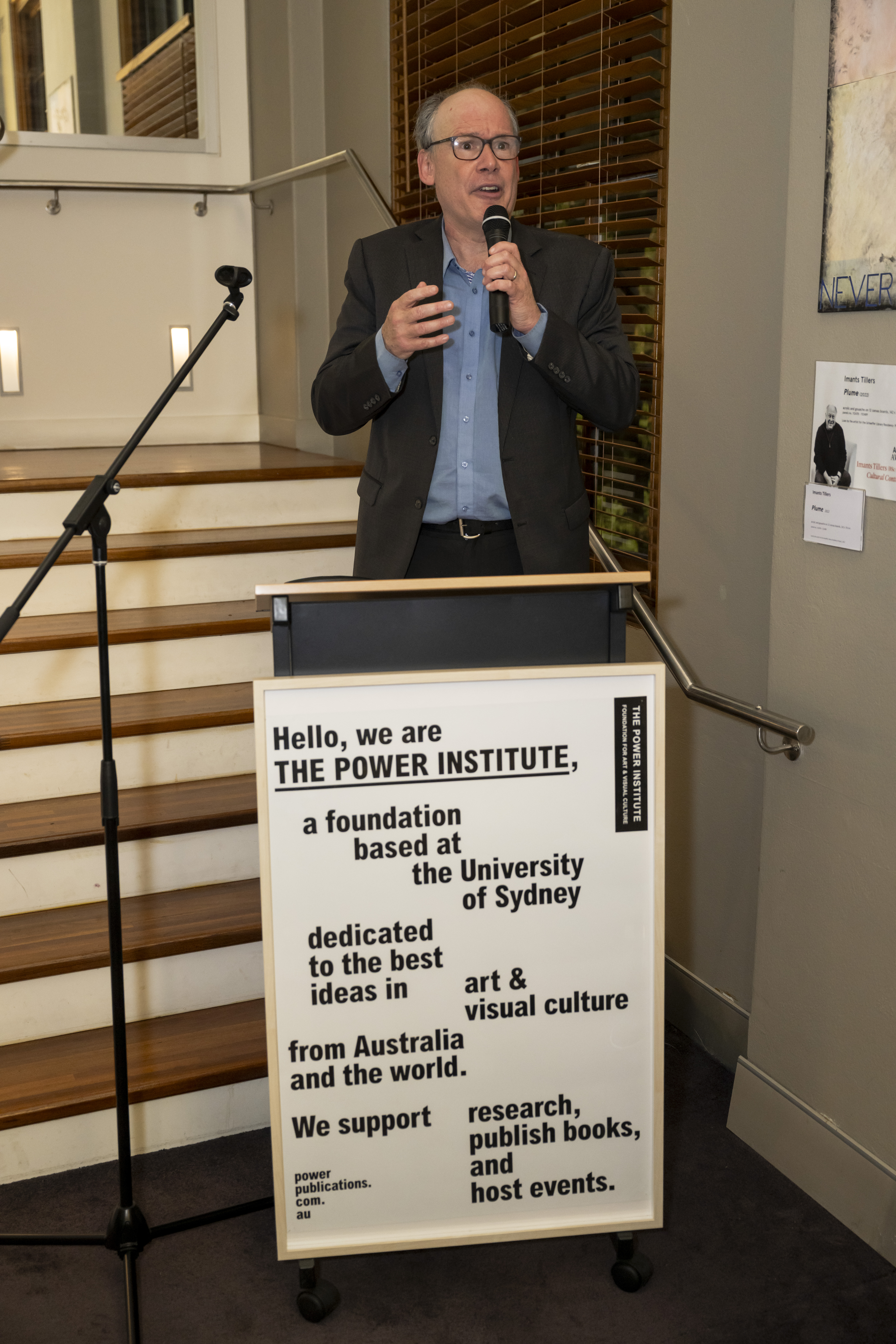 A photograph of Mark Ledbury giving a speech.