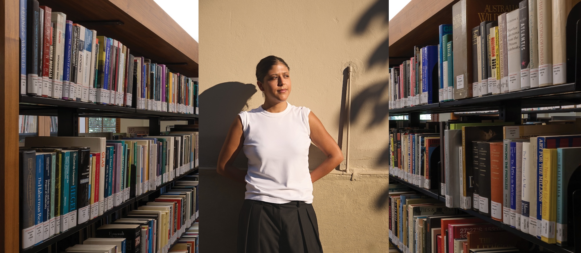 A photograph of Claudia Nicholson superimposed on a picture of bookshelves in the Schaeffer Library