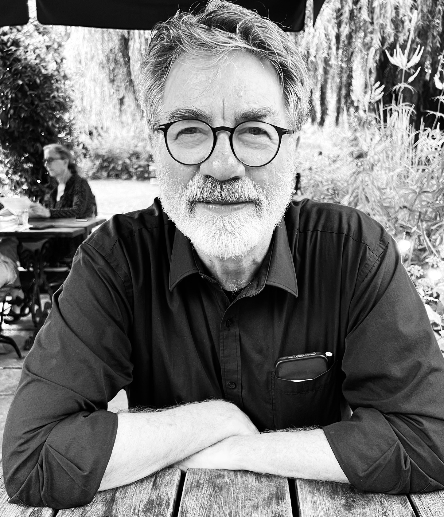 A black and white photograph of Geoffrey Batchen
